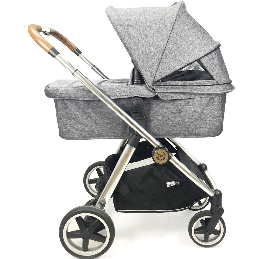 Cochecito duo Arrue OBE con plastico de lluvia