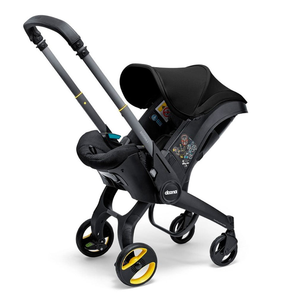 Silla Auto y Paseo Doona I