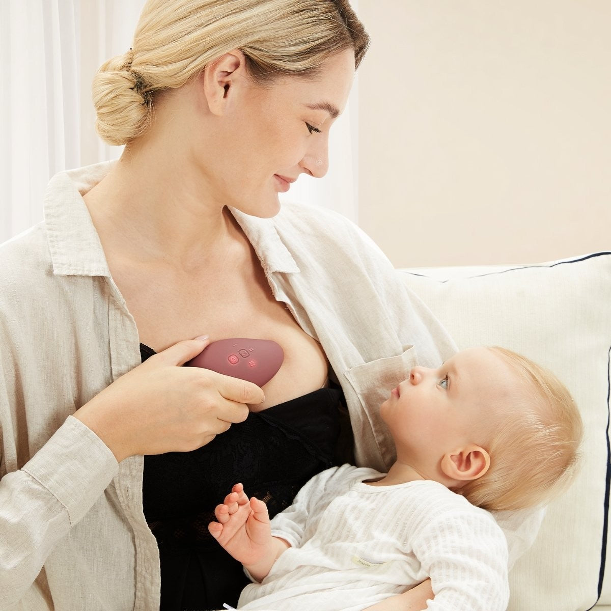 Masajeador de lactancia Momcozy calor+vibración