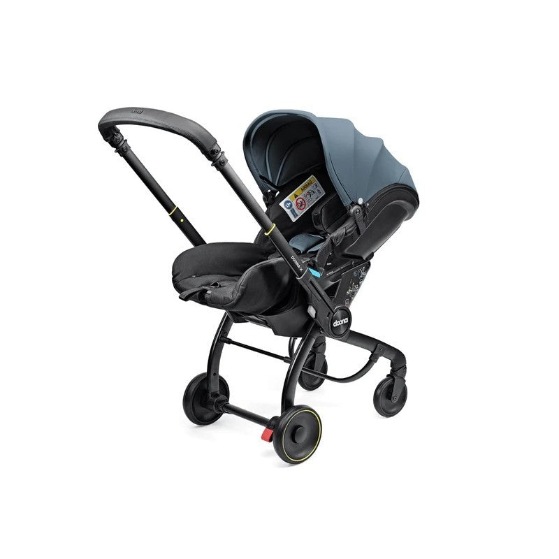 Silla Auto y Paseo Doona X con 3 posiciones de reclinacion