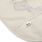 Babero con velcro Done By Deer Friends