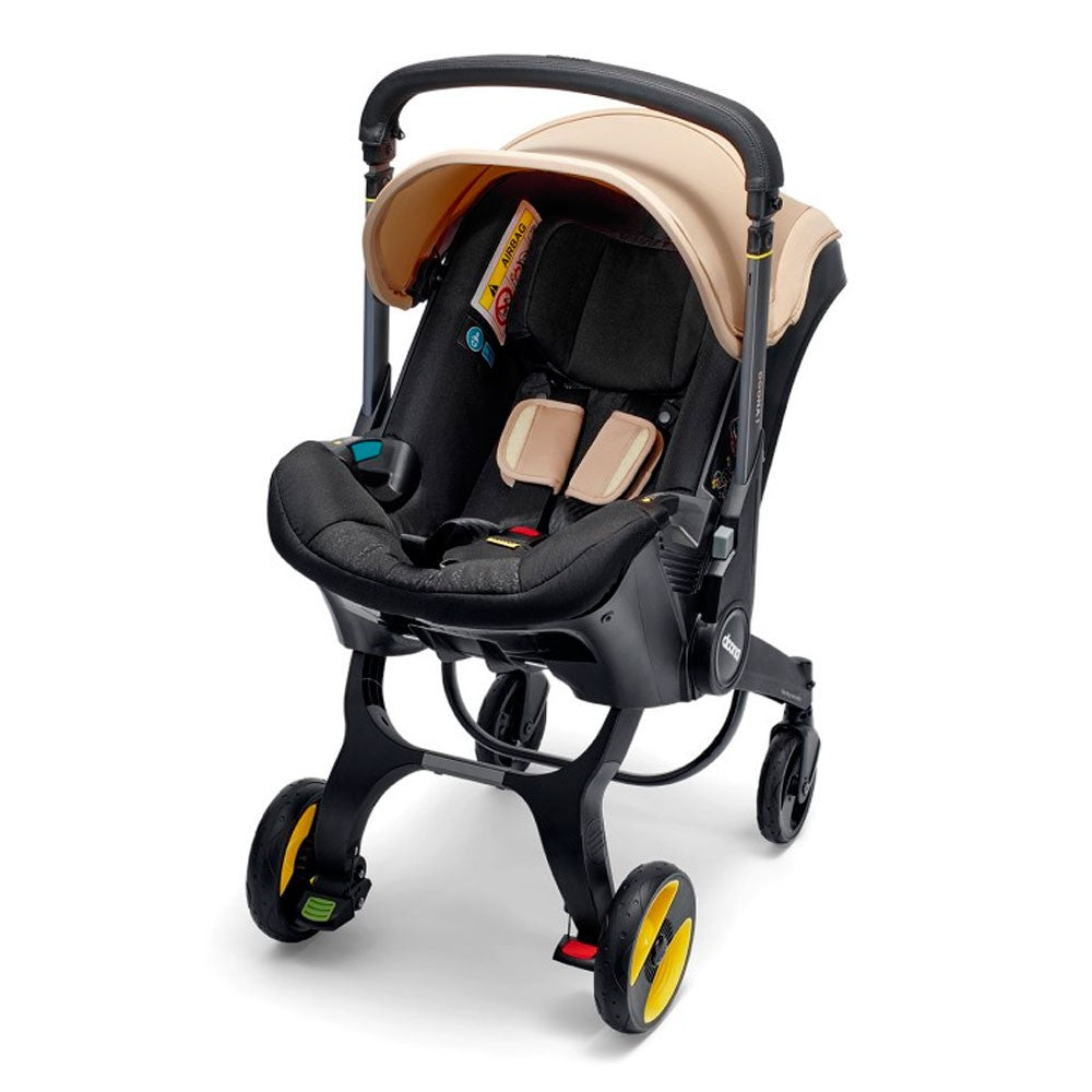 Silla Auto y Paseo Doona I