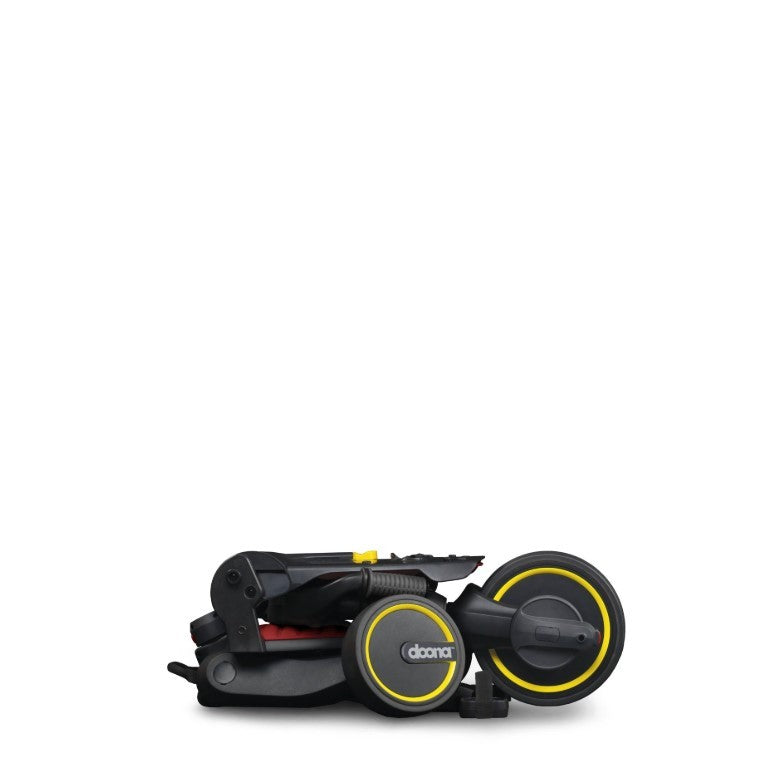 Triciclo 5 en 1 Doona LIKI TRIKE S3 con bolso y protector de arneses peso 6,7Kg.