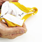 Bañador pañal Btbox Lunares mostaza UPF50+